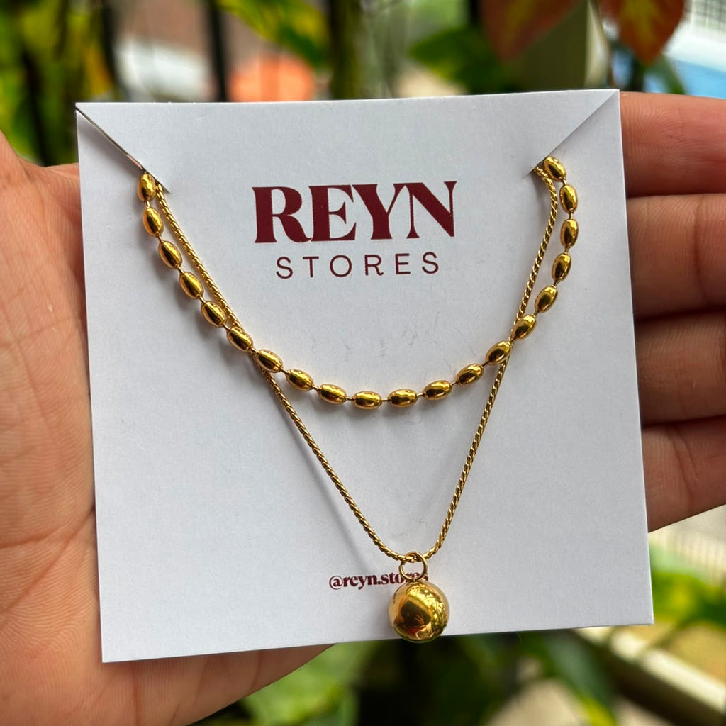 Layered bead and drop neckchain