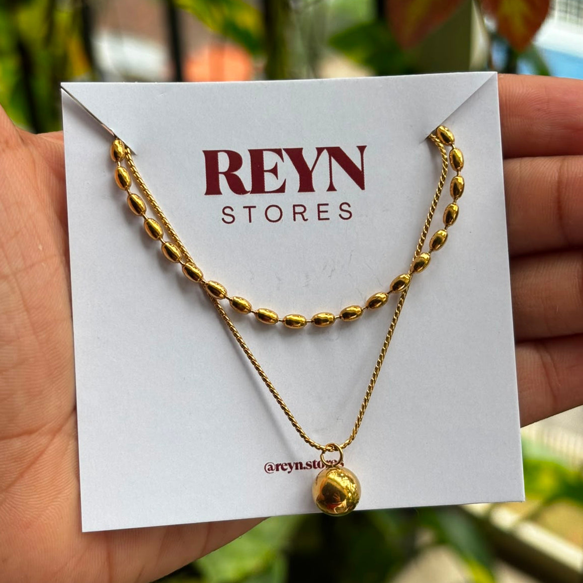 Layered bead and drop neckchain